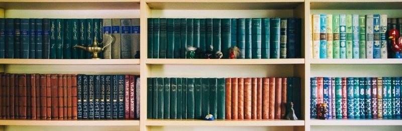 books-in-bookshelf-in-library